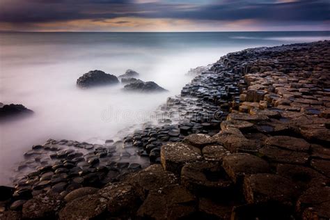 Long Exposure Of The Giants Causeway At Sunset Stock Photo Image Of