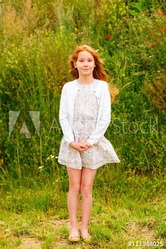 Outdoor Portrait Of A Cute Little Girl Of 8 9 Years Old