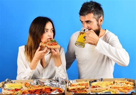 Loving Couple In Casual Clothes Eating Pizza Man Drinking Beer Woman