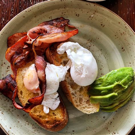 Poached Eggs On Toast With Bacon And Avocado At La Luciola Flickr