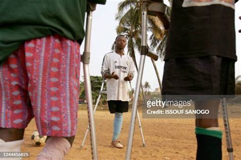 Amputee Crutches Photos And Premium High Res Pictures Getty Images