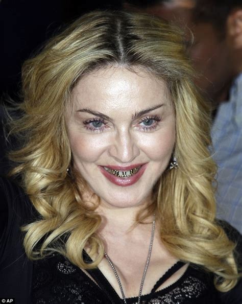 Madonna Shows Off Gold Teeth Grills As She Visits Hard Candy Fitness Studio In Rome Daily Mail