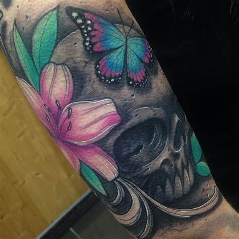 Maybe you would like to learn more about one of these? Girly skull and butterfly tattoo by Craig Holmes @ iron horse tattoo studio swan... - Girly ...