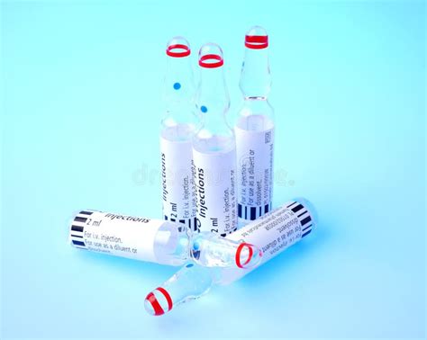 Ampoules Of Injections On A Blue Background Ampoule Stock Image