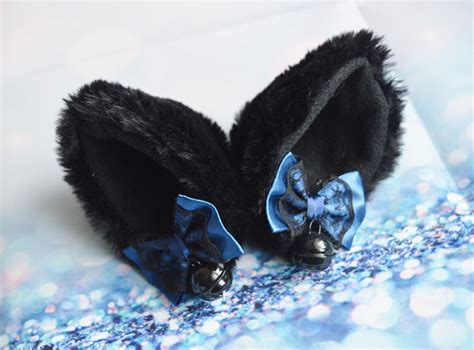 If your cat growls while lying on their back, they're agitated and ready to strike. Made to Order - Kitten play clip on cat ears with ribbon ...