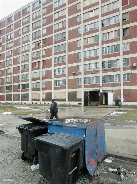 A Man Walks Past One Of The Few Remaining Chicago Housing Authority