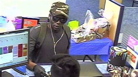 Photos Of Bank Robbery Suspect Released To Help Police Case Cbc News