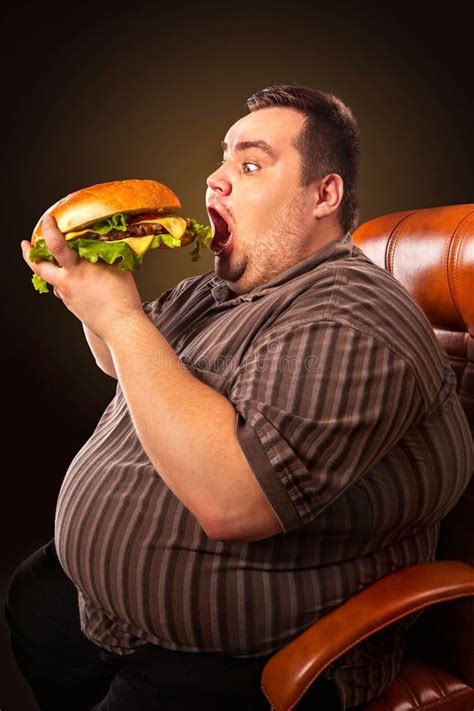 Fat Man Eating Burger