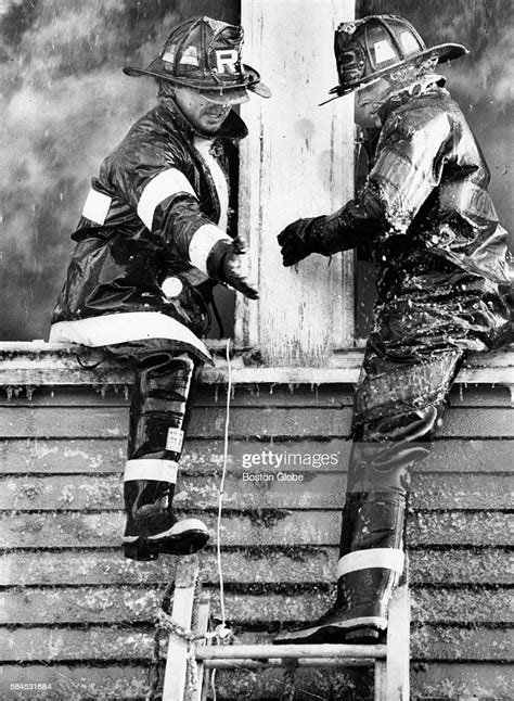 Two Boston Firefighters Escape A Fire In A House On Bourne Street In