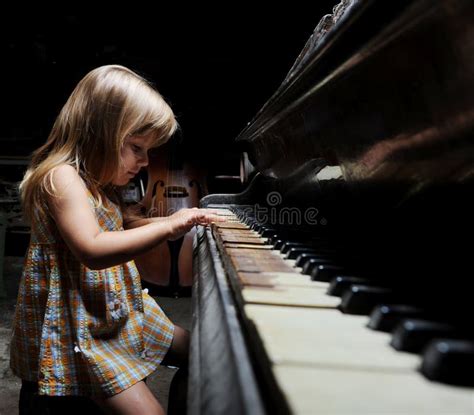 Girl Playing On An Piano Stock Photo Image Of Brown 15654124