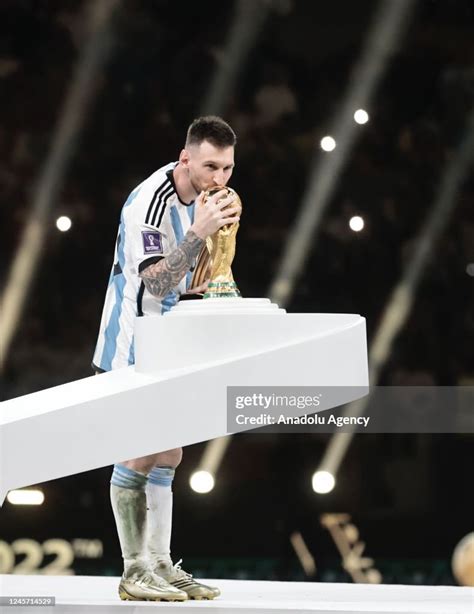 Lionel Messi Of Argentina Kisses The Fifa World Cup Trophy During The