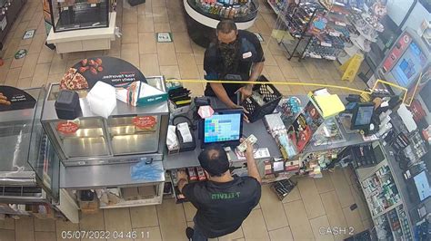 Surveillance Camera Captures Armed Robbery At Palm Springs Convenience Store