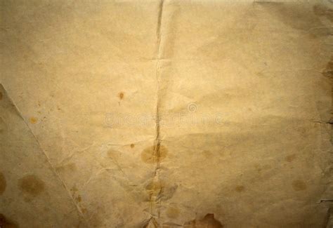 The Texture Of Old Yellowed Paper With Spots And Scratches Vintage