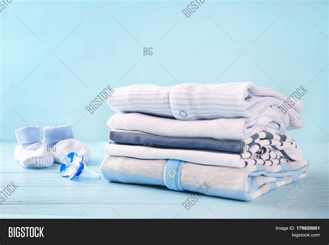 Pile Baby Clothes On Image And Photo Free Trial Bigstock