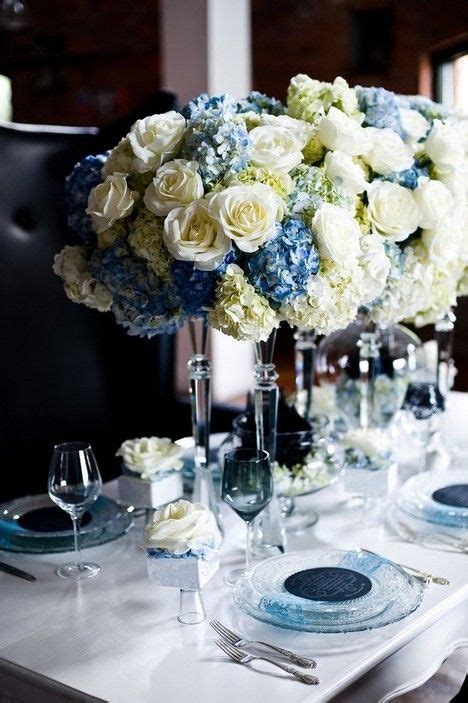 Tall Centerpieces With White Roses Blue Hydrangea And