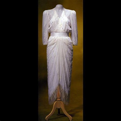 Princess diana arrives at st paul's cathedral in her incredible wedding dress for marriage to prince charles on 29 july 1981. Zandra Rhodes gown in silk chiffon, c.1980s, from the ...