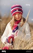 Portrait of a cute young girl in pink hat and Winter clothing on Stock ...