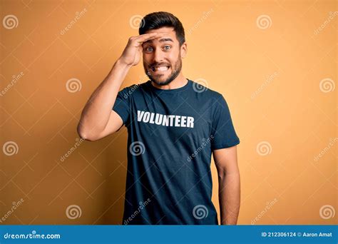Young Handsome Man with Beard Volunteering Wearing T-shirt with