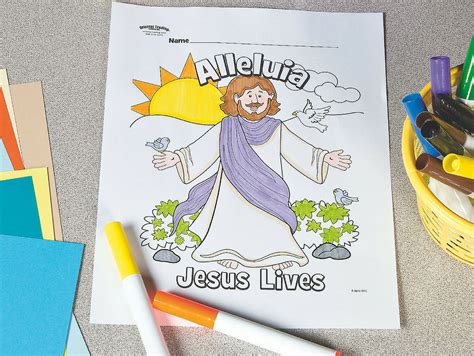 The Jesus Lives Coloring Book Is Next To Markers And Crayons On The Table