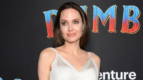 Angelina Jolie Is Glam And Gorgeous In Rare Sighting During Paris Photo