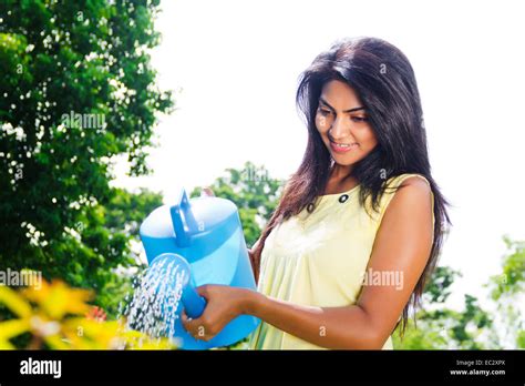Indian Women Watering Plants Hi Res Stock Photography And Images Alamy