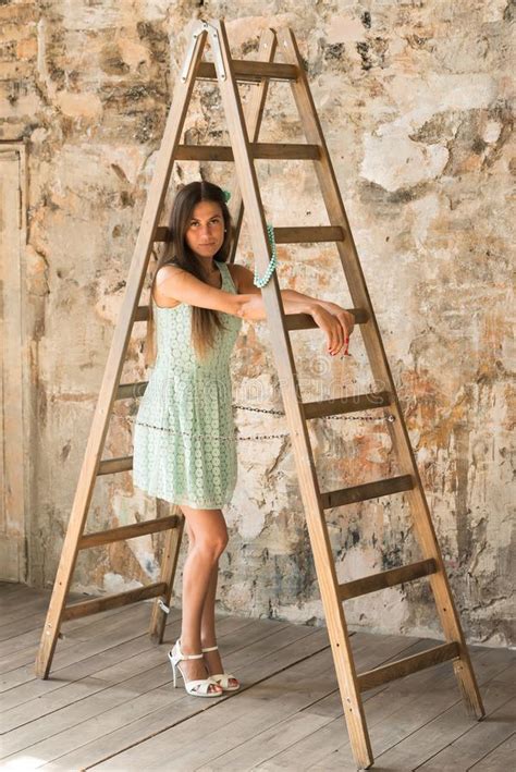 Beautiful Teen Girl Posing With Ladder In Studio Stock Photo Image Of