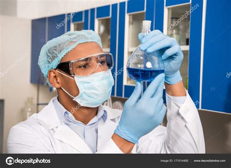 Scientist Examining Test Tube — Stock Photo © Alexlipa 171014492