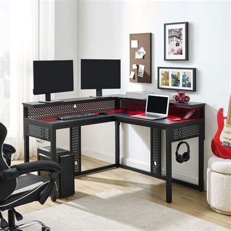 With a black tempered glass desktop. Alpha L-Shaped 54"W Gaming Desk - Black | Best Buy Canada