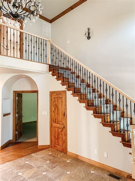 You'll also need balusters — key players in support for the railing, safety and additional style — and newel posts , the main pillar at the front of the staircase also. How We Completely Updated our Stair Railings by Only Swapping out the Balusters - Chris Loves Julia