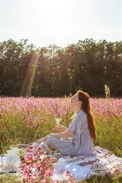 redhead beautiful woman at picnic by stocksy contributor liliya rodnikova stocksy