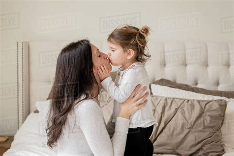 Mom Daughter Kissing Telegraph