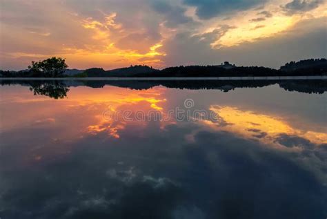 Sunset Over Lake Stock Photo Image Of Clouds Reflection 69961752