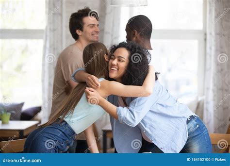 Happy Mixed Race Young Couples Greeting Each Other Stock Photo Image