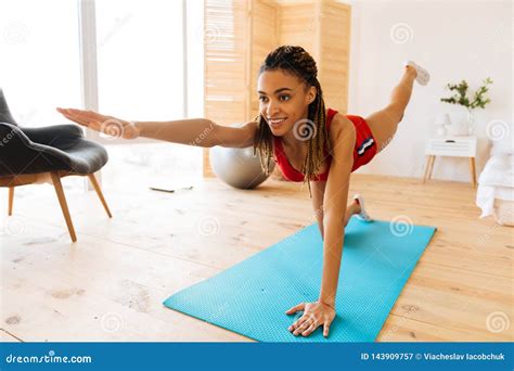 Woman Feeling Cheerful And Energized While Doing Yoga At Home Stock Image Image Of Lifestyle