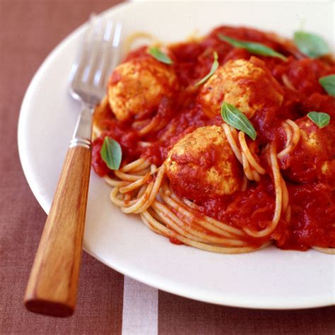 In a large bowl, combine ground chicken, 1 cup cooked rice, 1 egg, grated onion, 1 pressed garlic clove, 1/2 tsp salt and 1/4 tsp pepper. Spaghetti with chicken meatballs | Healthy Recipe | WW UK
