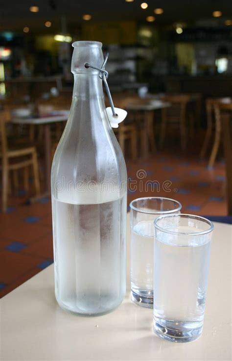 Water Bottle And Glasses Water Bottle Glasses Restaurant Table