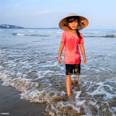vietnamese-little-girl-on-the-beach-vietnam-high-res-stock-photo