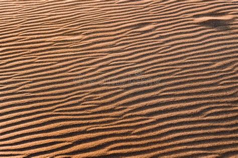 Orange Nature Texture Of The Sand And Dunes Rippled Surface Top Angle