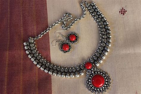 Advaita Handicrafts German Silver And Red Stone Jewellery Set Art