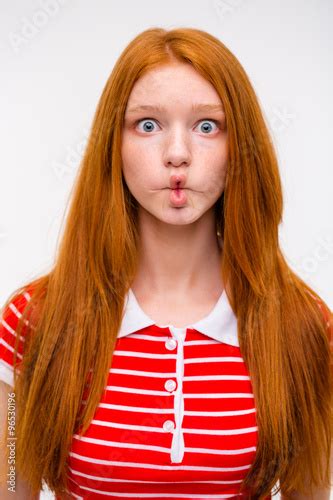 Funny Redhead Girl Fooling Aroung And Making Funny Faces Kaufen Sie