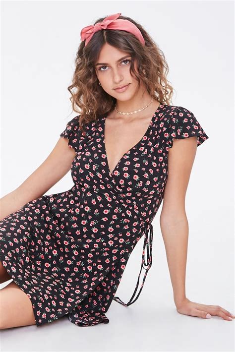 forever 21 floral print mini wrap dress kaia gerber wearing black floral dress with jacob