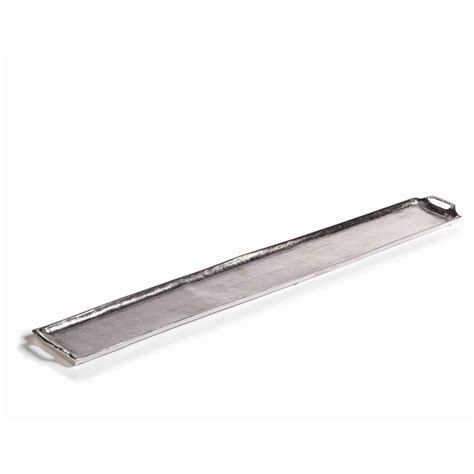 The surface is made from engineered wood (hello, industrial vibes), and has a tray edge that helps keep items from rolling off the top. Zodax 40-Inch Long Raw Nickel Tray - Silver | Silver tray ...
