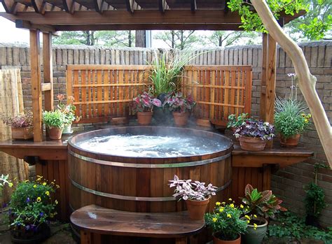 The dimension is 76 x 66 x 32 inches which makes it quite spacious, it also has a single lounge seat. Cedar Wood Hot Tubs Custom Wood Hot Tubs Electric or Gas Heat