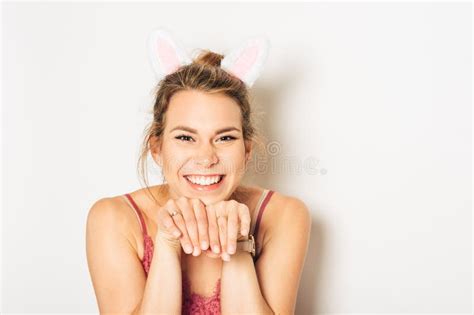 Studio Shot Of Beautiful Young Woman Wearing Bunny Ears Stock Image