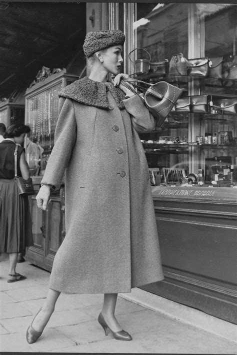 1950 A Model Wearing A Coat With Fur Collar And Hat 60s Fashion Trends