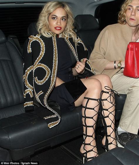 Rihanna Who Rita Ora Steps Out In Daring Thigh High Split Dress With