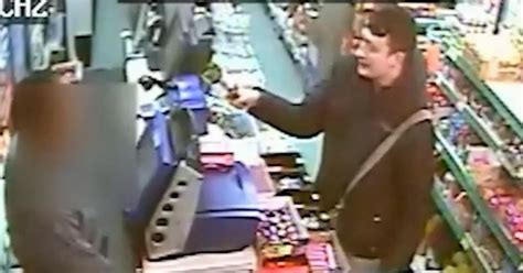 Armed Robber Threatens Terrified Shop Worker With A Broken Bottle In