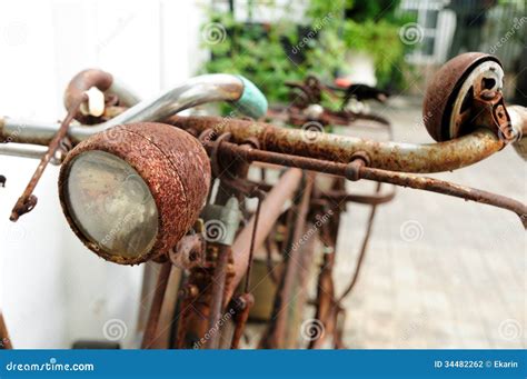 Antique And Damaged Bicycle Parked Next To Wall Stock Photo Image Of