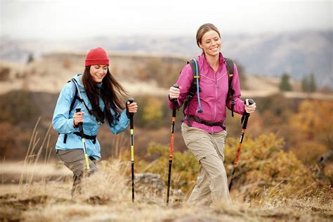 Two Females Smile While Day Hiking Photograph By Jordan Siemens Pixels