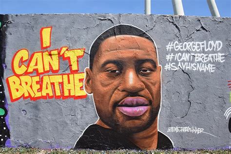 A mural of george floyd collapsed in ohio, but there were conflicting accounts about whether the cause was a lightning strike or structural issues. Say his name. George Floyd. He was a human being.